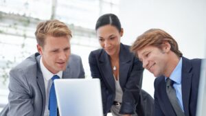 Do employers have to provide health insurance business professionals discussing coverage options.